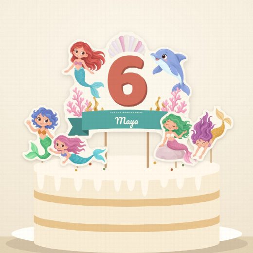 Gâteau d’anniversaire sirènes décoré du cake topper au prénom et de ses quatre petits pics à imprimer