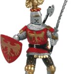 Figurine de chevalier en armure rouge et argent avec épée, bouclier à l'aigle doré et heaume à cimier