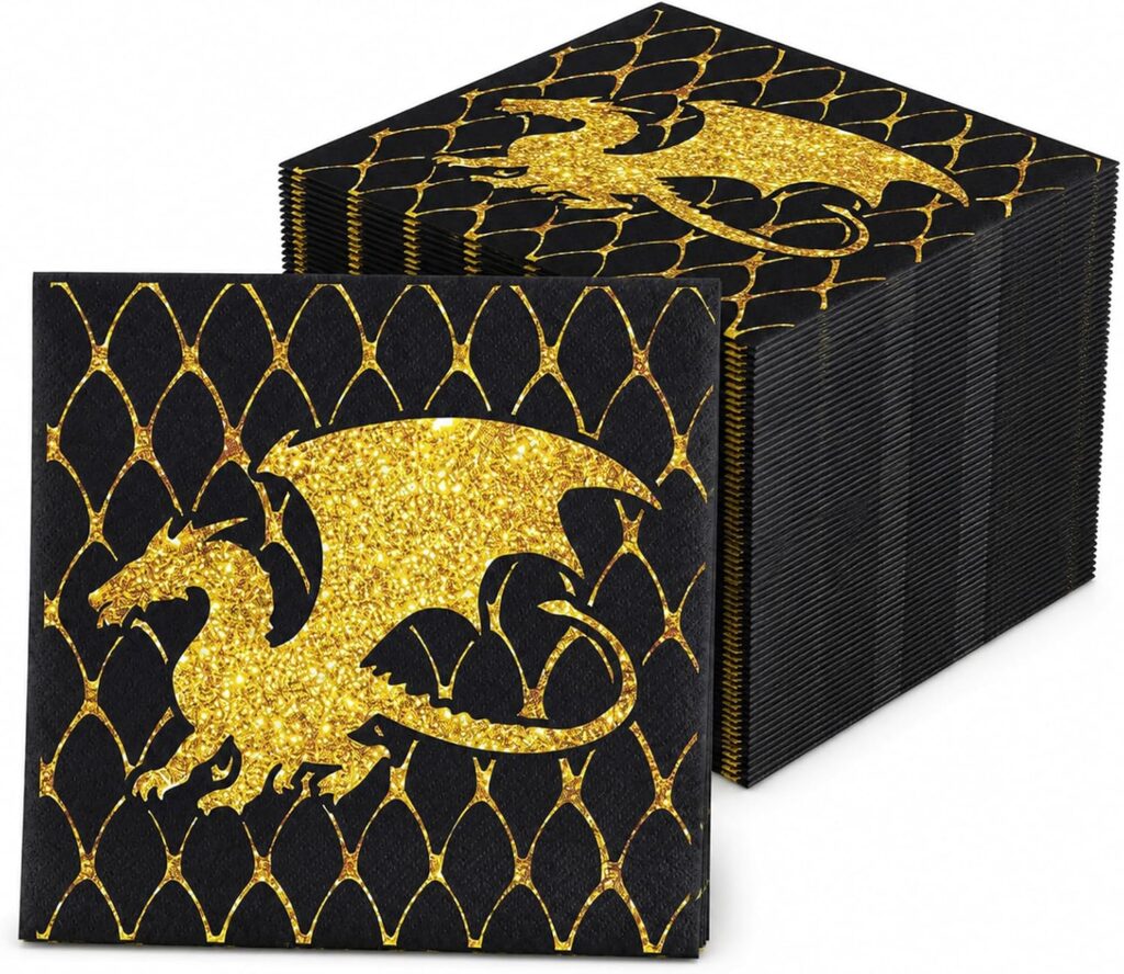 Serviettes en papier noires au dragon doré pailleté pour dresser une table de banquet médiéval