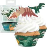 Cupcakes à la crème avec caissettes jungle et toppers tricératops et T-Rex pour un goûter d'anniversaire dinosaure