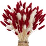 Lagurus séchés rouges et blancs dans un vase habillé de jute, décor de mariage bordeaux