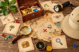 Carte au trésor, cartes d'énigmes illustrées, coffre à bijoux, boussole et loupe pour une chasse au trésor enfant