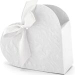 Boîte à dragées blanche en forme de cœur, motifs en relief et nœud en satin, contenant à dragées pour un baptême