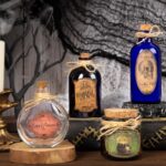 Fioles de potions décoratives en verre avec étiquettes anciennes et bouchons de liège pour un anniversaire Harry Potter